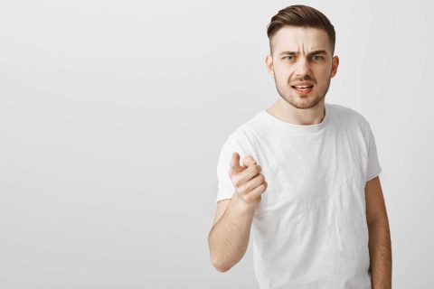 disappointed-angry-young-man-pointing-finger-accusation-scolding-someone_optimized