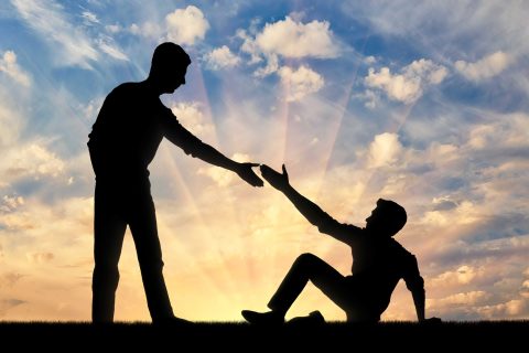 silhouette-man-giving-helping-hand-another-man-who-fell-ground-concept-helping-hand_optimized