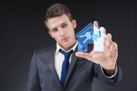 young-handsome-businessman-mortgage-concept_optimized