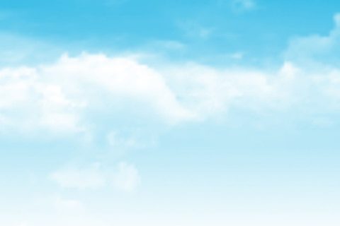 Realistic clouds in a blue sky background